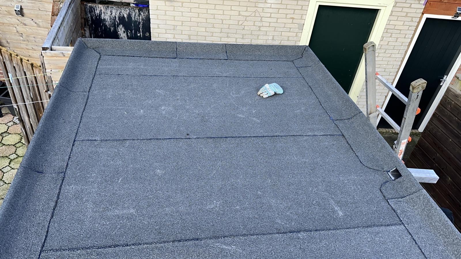 image of contractor on rooftop